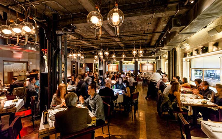 qinyc-dining-room-with-people-light-blur